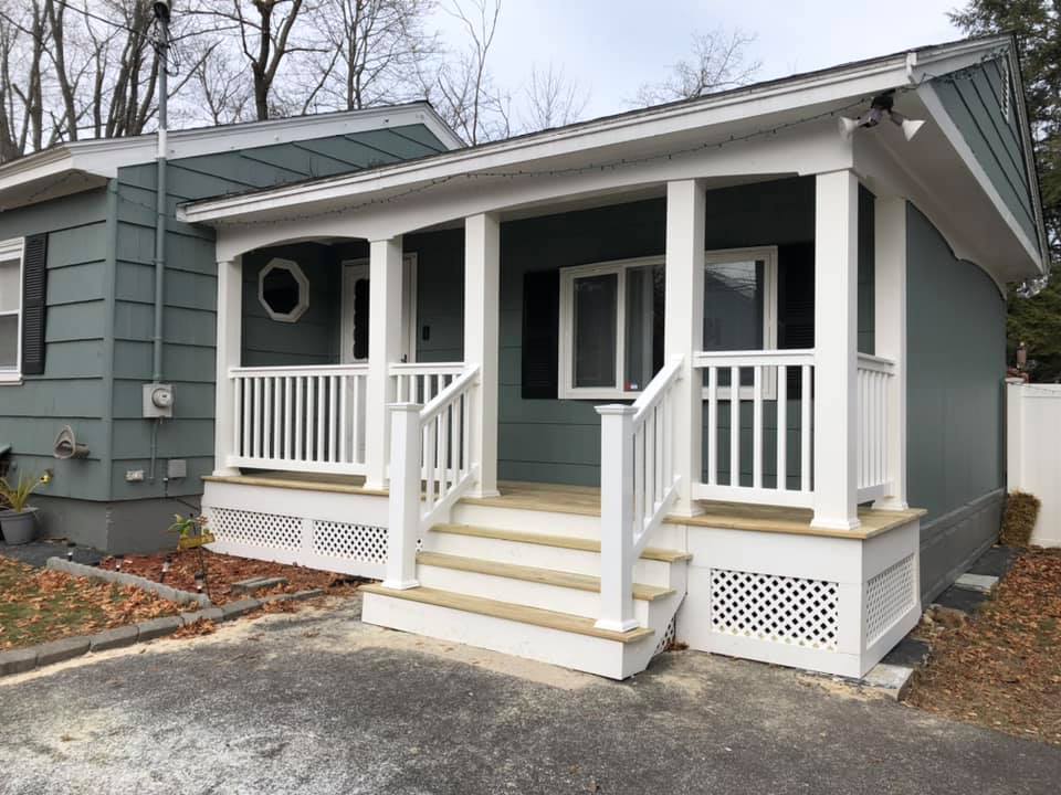152221015_361875871651479_7429226262117313881_n Small house with a white porch entrance.